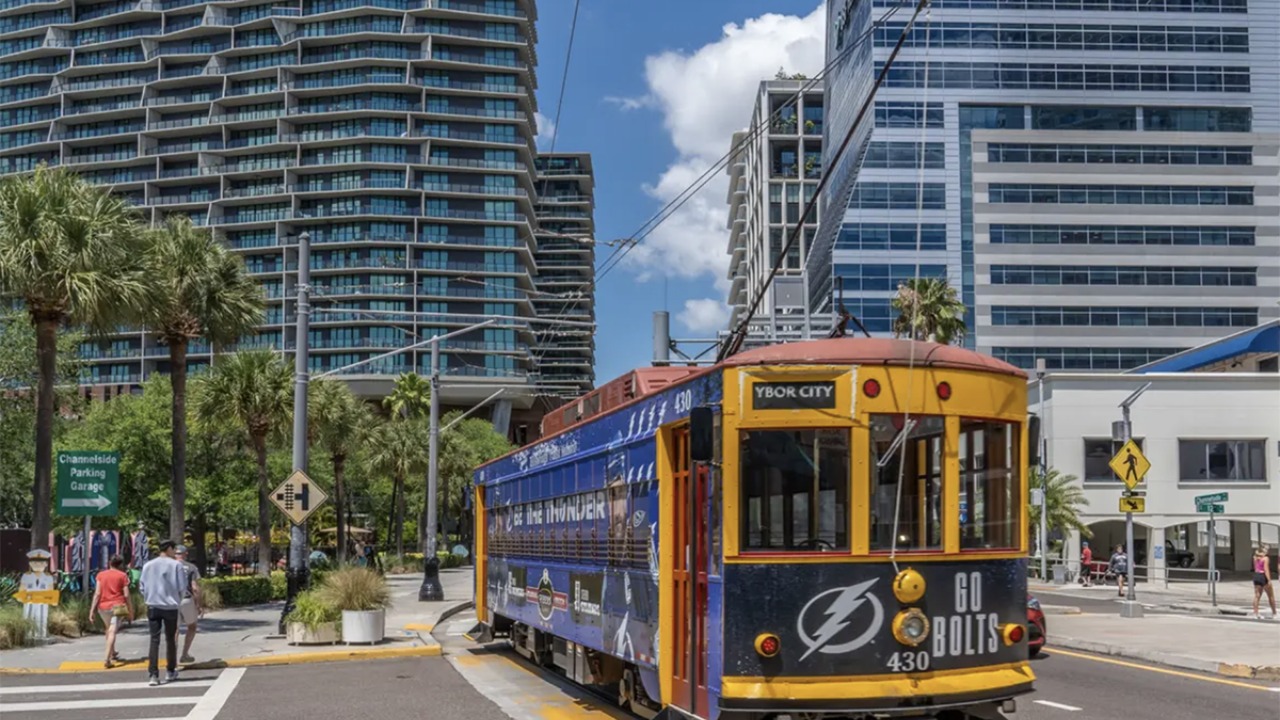 Tampa streetcar passes through downtown Water Street district near Cumberland Avenue