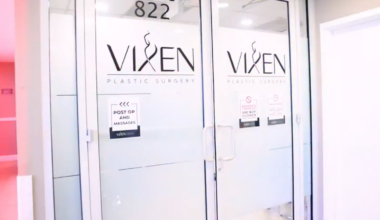 A screenshot from a YouTube video of doors to a plastic surgery clinic that read "VIXEN"