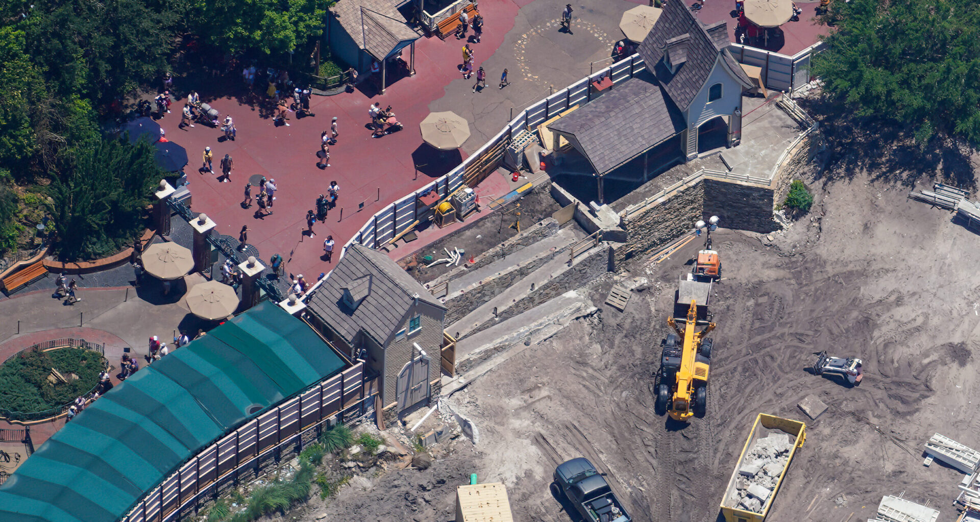 The latest aerial photos show that construction has continued to advance from early clearing and grading into more infrastructure work.
