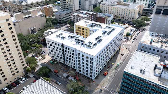 Parking plan, first residents, and retail timeline take shape at Pearl Square downtown