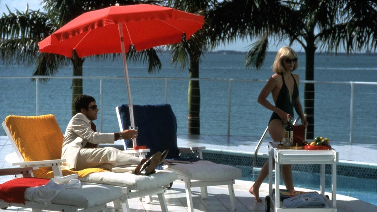 Al Pacino and Michelle Pfeiffer poolside scene in Scarface