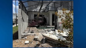 Vehicle crashes into Orlando home, one patient hospitalized