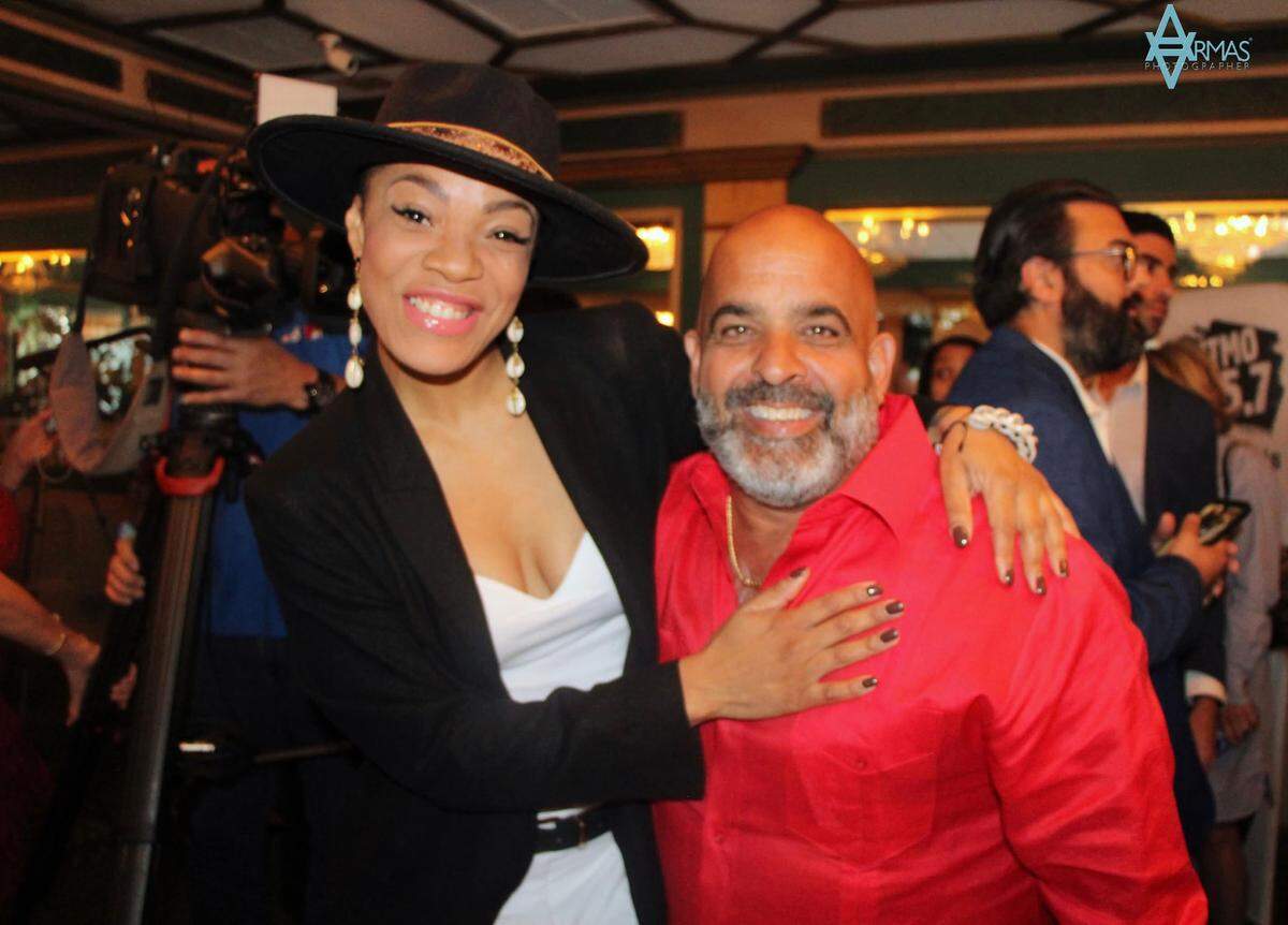 Cuban artist Brenda Navarrete with Peter Regalado, Executive Director of CubaNostalgia.