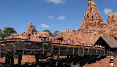 Guests riding Big Thunder Mountain Railroad at Magic Kingdom in Disney World
