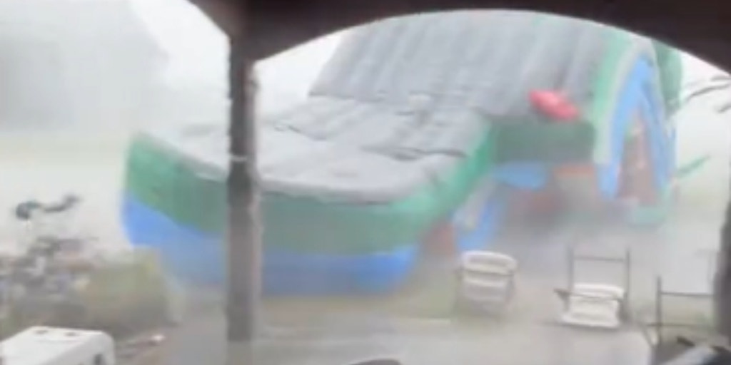 Must-see video: Strong storms send bounce house flying through yard in Florida
