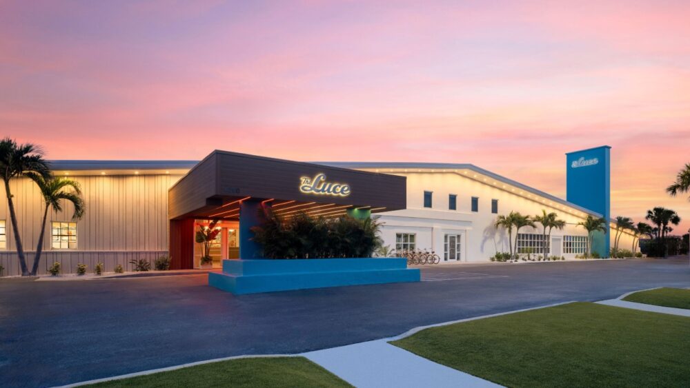 Exterior of The Luce Marriott Tribute Portfolio hotel on St. Pete Beach at sunset