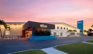 Exterior of The Luce Marriott Tribute Portfolio hotel on St. Pete Beach at sunset