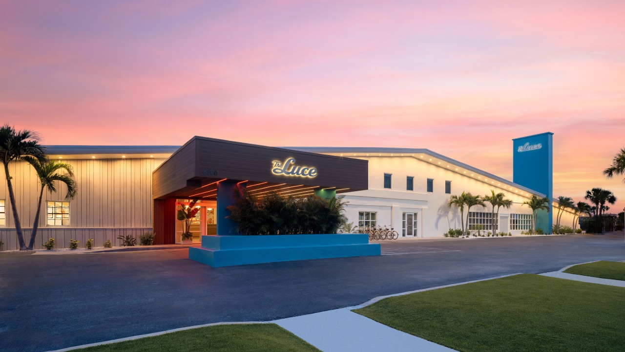 Exterior of The Luce Marriott Tribute Portfolio hotel on St. Pete Beach at sunset