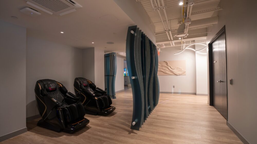 Power Design recovery room with massage chairs and wellness space at St. Petersburg headquarters