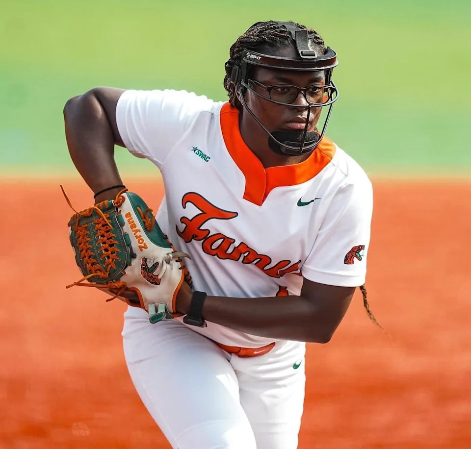 Florida A&M Rattlers' Zoryana Hughes prepares to pitch to an opponent during an NCAA college softball game.