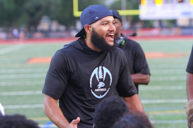 Dr. Phillips coach Caleb Walls lets his team know at halftime that he was not pleased with the effort during a 42-28 loss to Winter Park in a spring game Tuesday night. (Chris Hays/Orlando Sentinel)