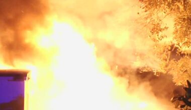 Fire crews race to extinguish massive blaze at RV, home in Northwest Miami-Dade