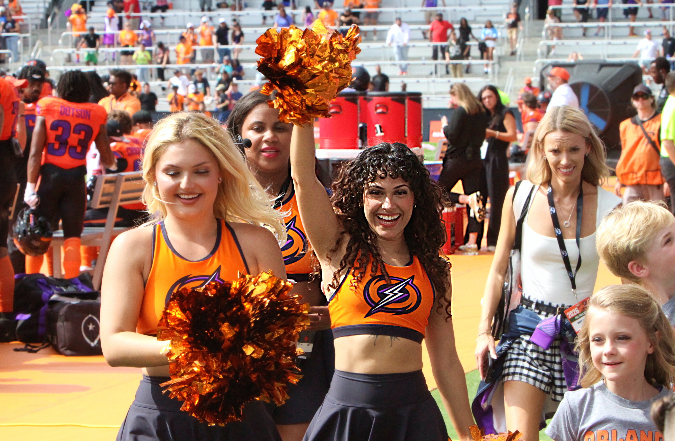 The Orlando Storm Surge dance team shows their support during...