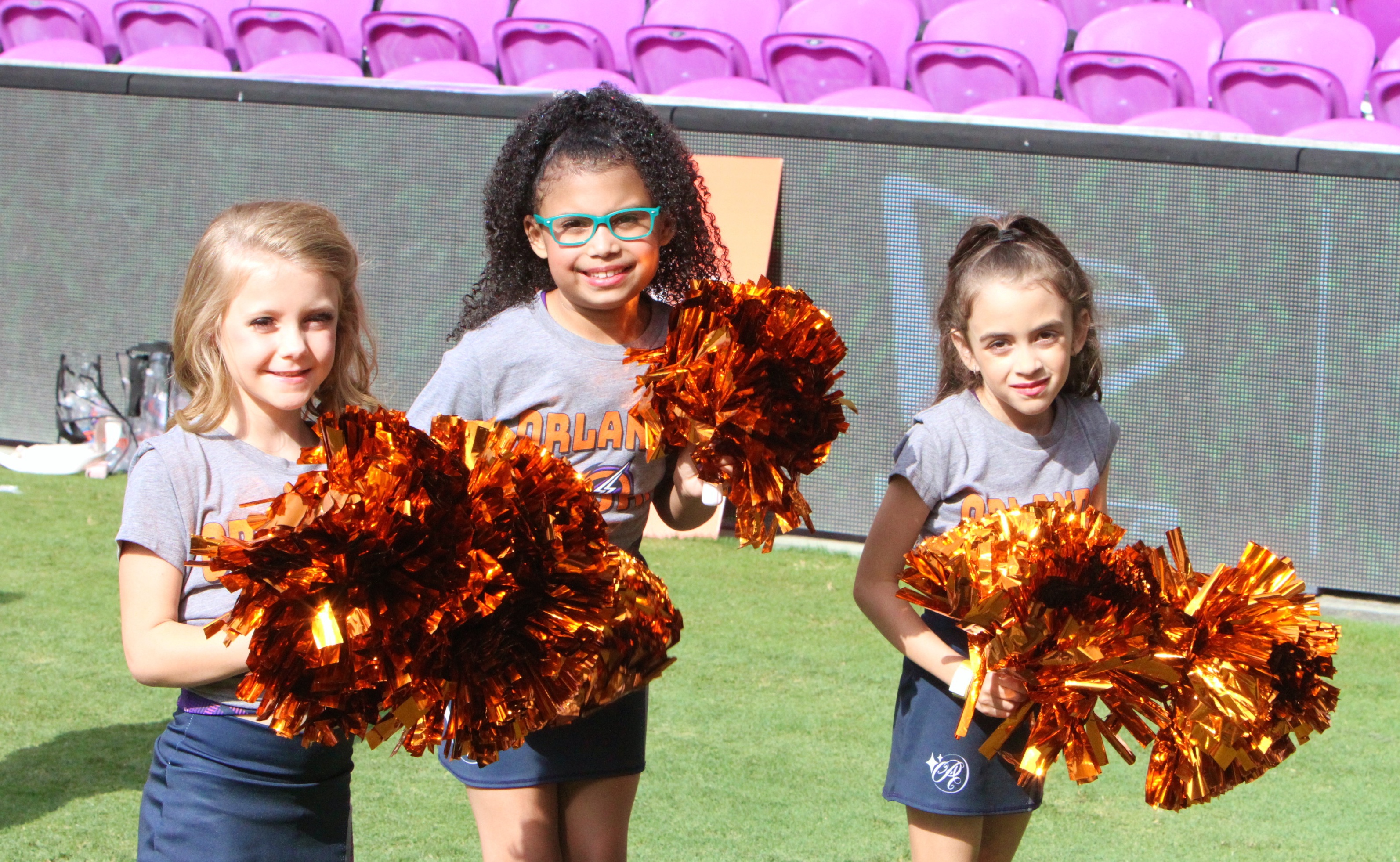 Young members of the Orlando Storm Surge dance team show...