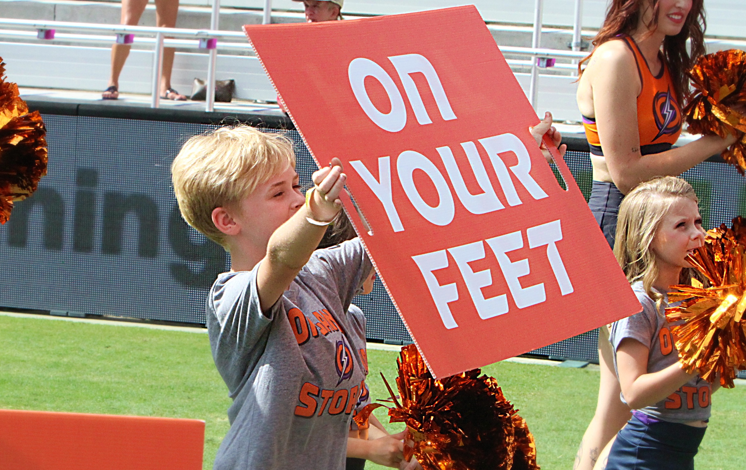 A young Orlando Storm Surge yell leader shows his support...