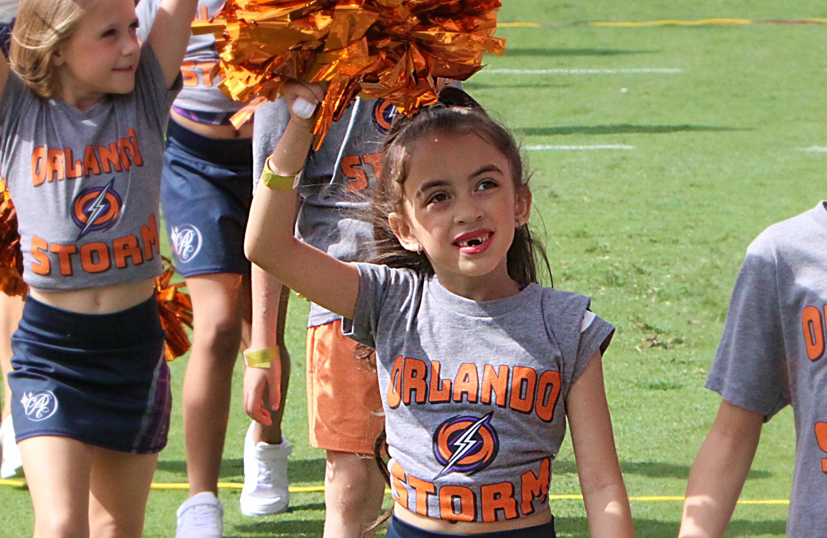 A young Orlando Storm Surge dancer shows her support during...