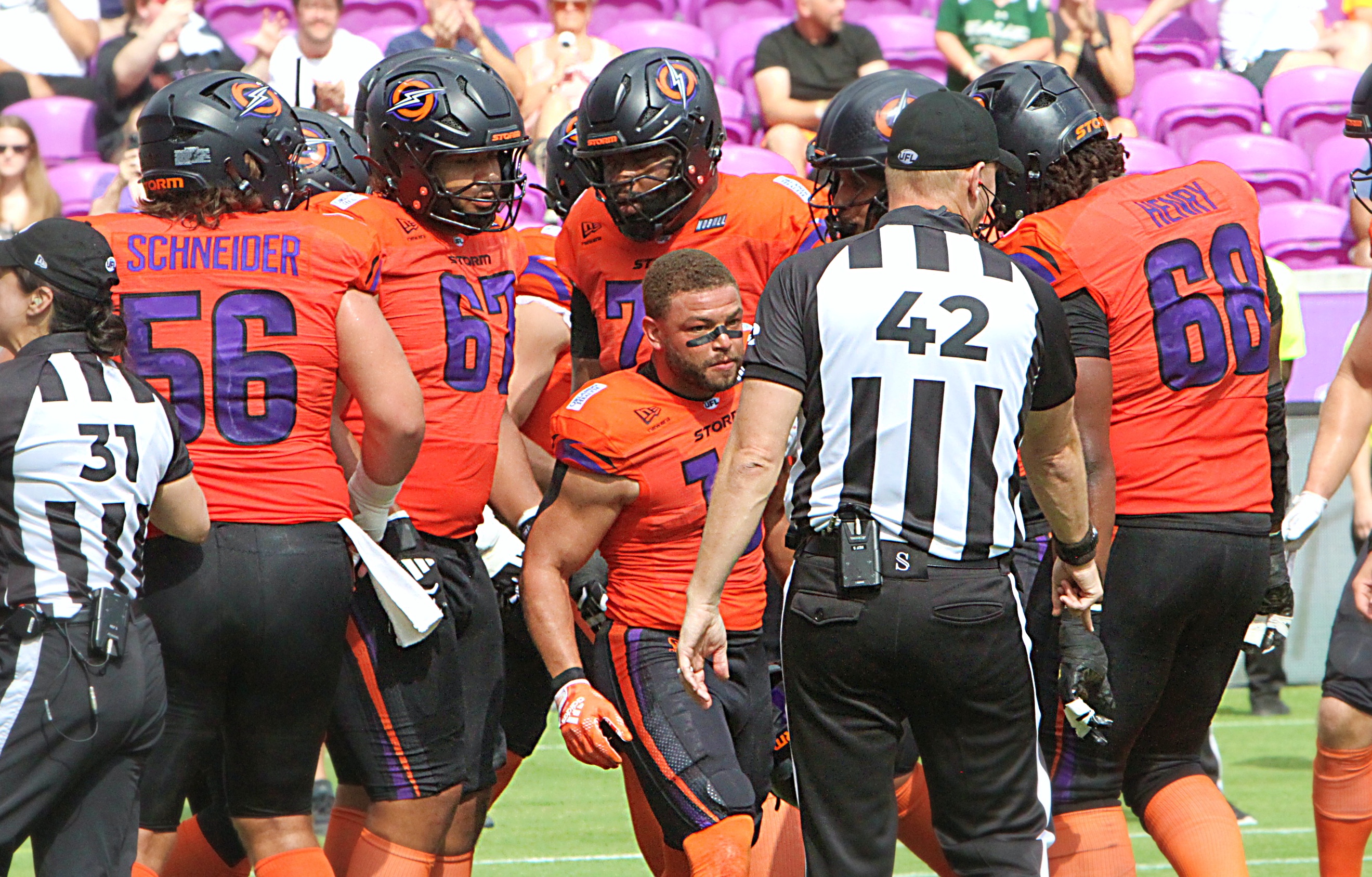 Orlando offensive linemen congratulate Chris Rowland after a touchdown during...