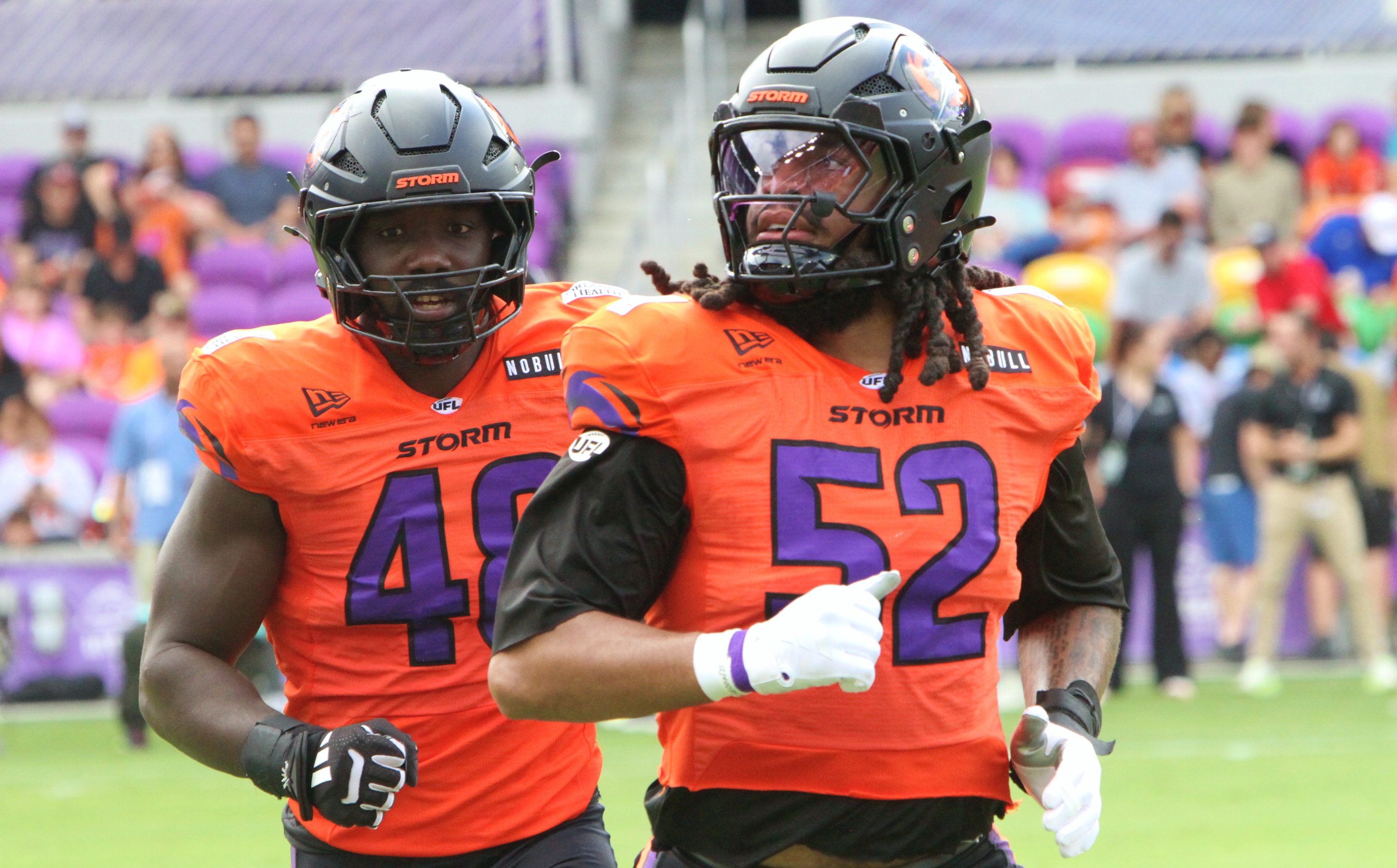 Orlando defensive ends Chris Garrett and Keshawn Banks come off...