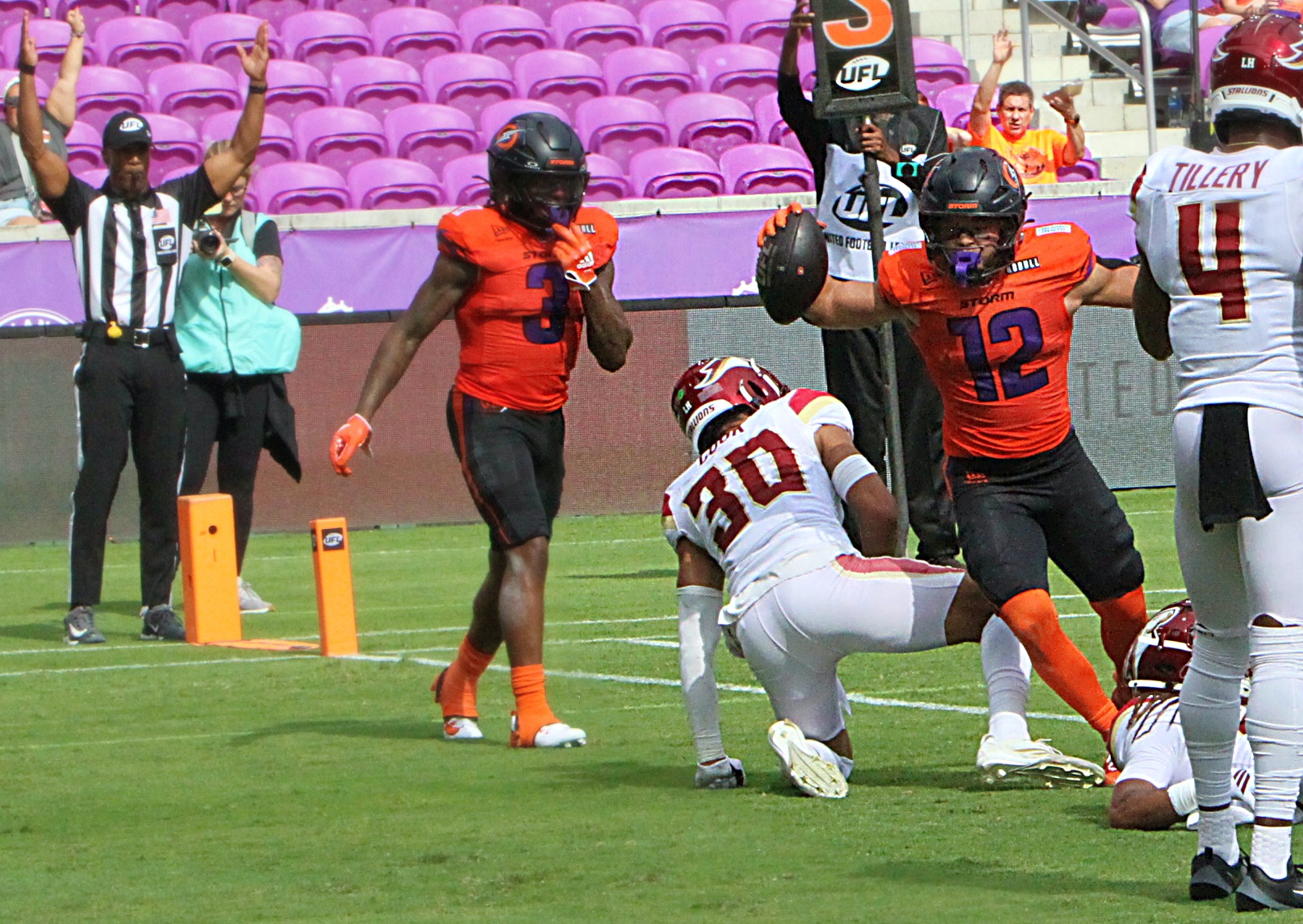 Orlando Storm receiver Chris Rowland (12) scores a tochdown during...