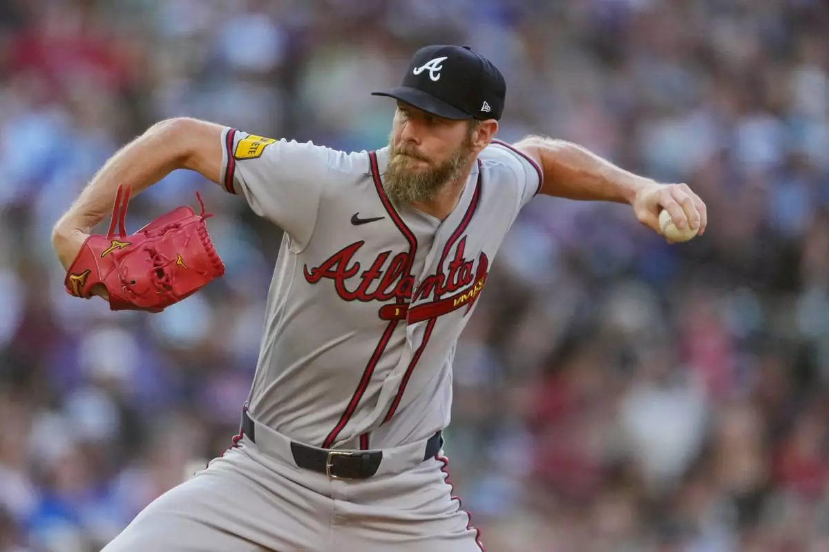 Atlanta Braves starting pitcher Chris Sale works against the Colorado Rockies in the first inning of a baseball game, Saturday, May 2, 2026, in Denver. (AP Photo/David Zalubowski)