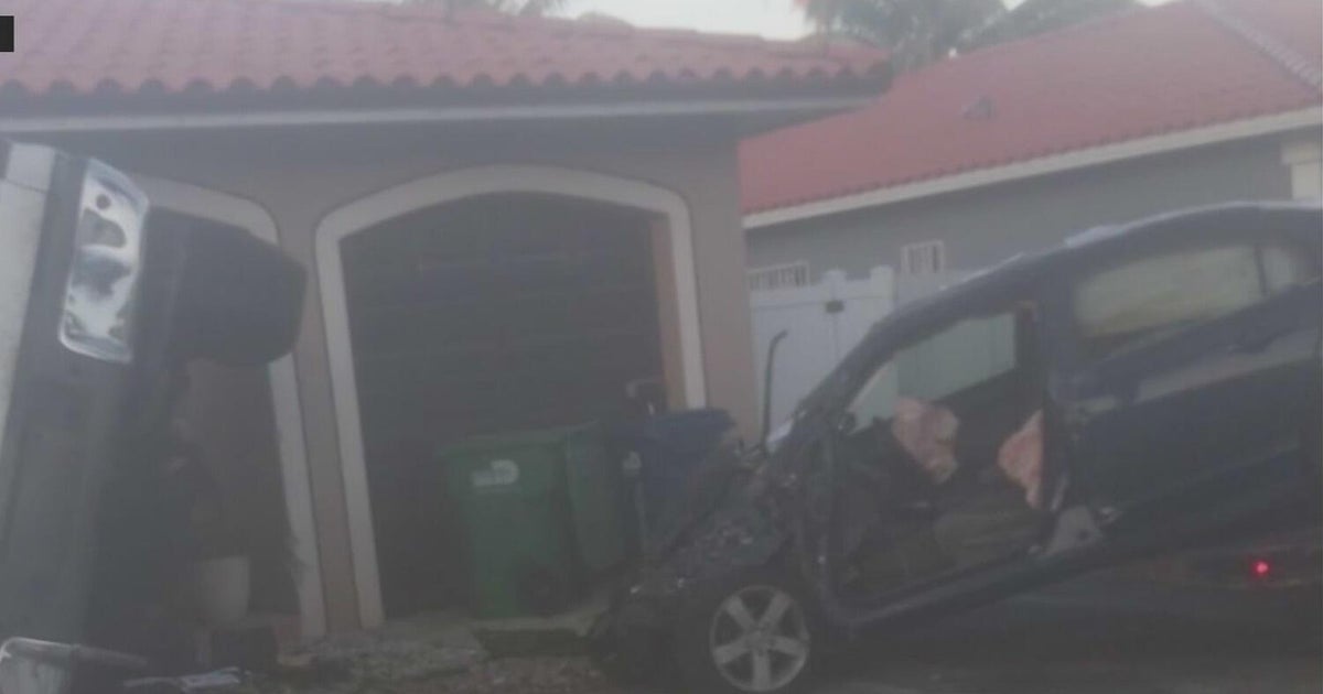 Driver crashes into NW Miami-Dade home in newly released surveillance video as neighbors demand traffic safety changes