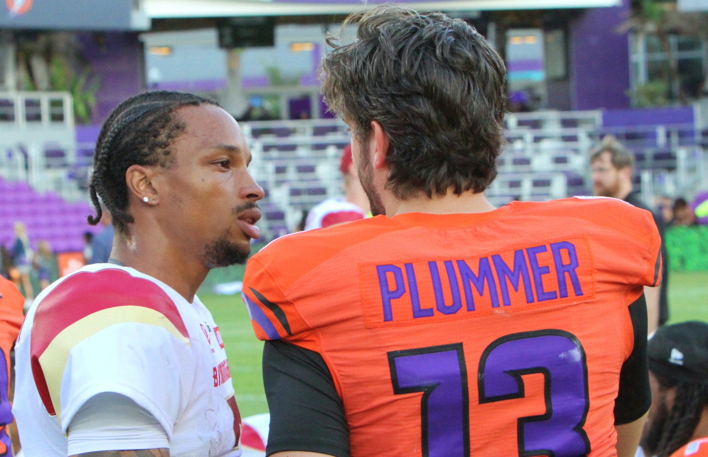 Former Orlando Storm quarterback Dorian Thompson-Roobinson greets current Storm quarterback...