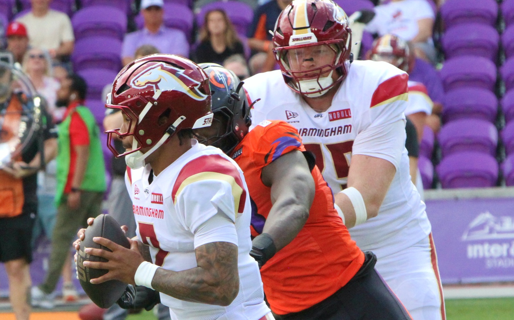 Birmingham Stallions quarterback Dorian Thompson-Robinson avoids pressure during the Birmingham...
