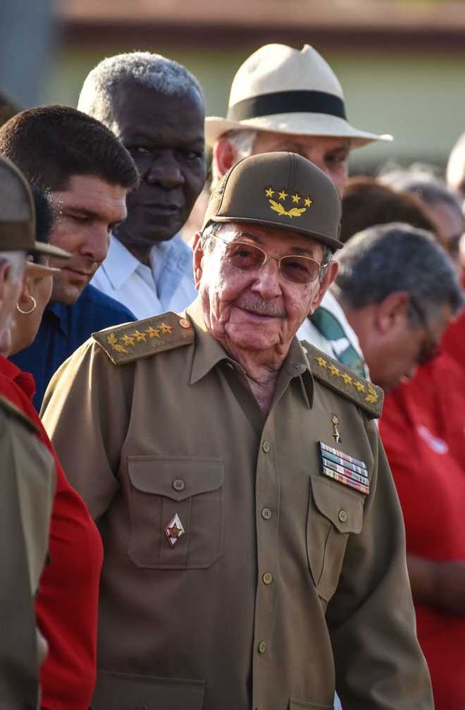 CUBA-MONCADA-ANNIVERSARY-CASTRO Cuban president Raul Castro (L) is seen during celebrations of the 64th anniversary of the guerrilla assault on the Moncada Barracks, widely regarded as the beginning of the Cuban Revolution, in Pinar del Rio Province, on July 26, 2017. / AFP PHOTO / ADALBERTO ROQUE (Photo credit should read ADALBERTO ROQUE/AFP via Getty Images)