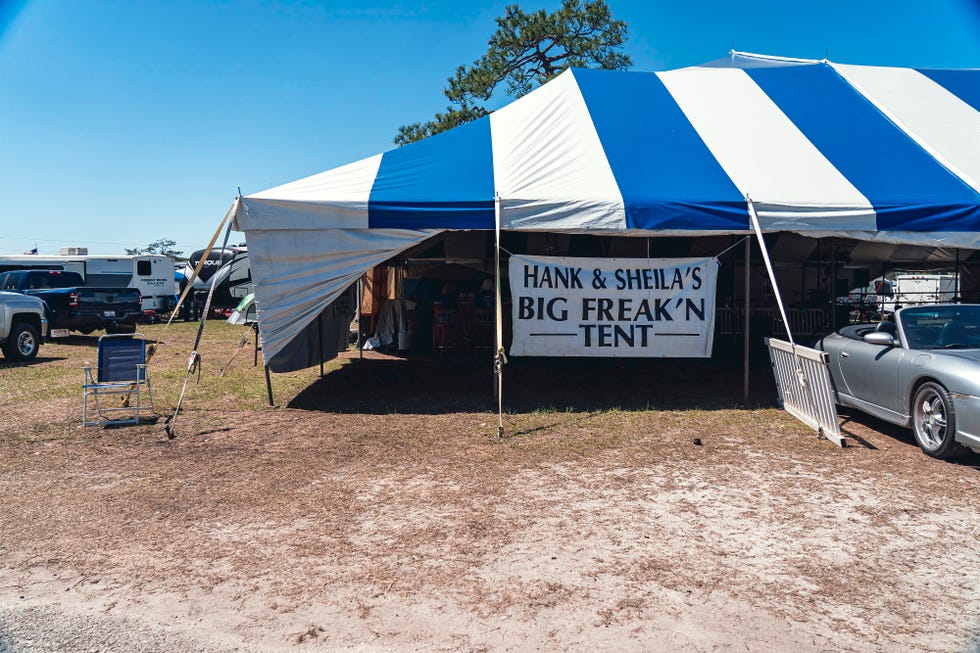 tent promoting an event with seating outside