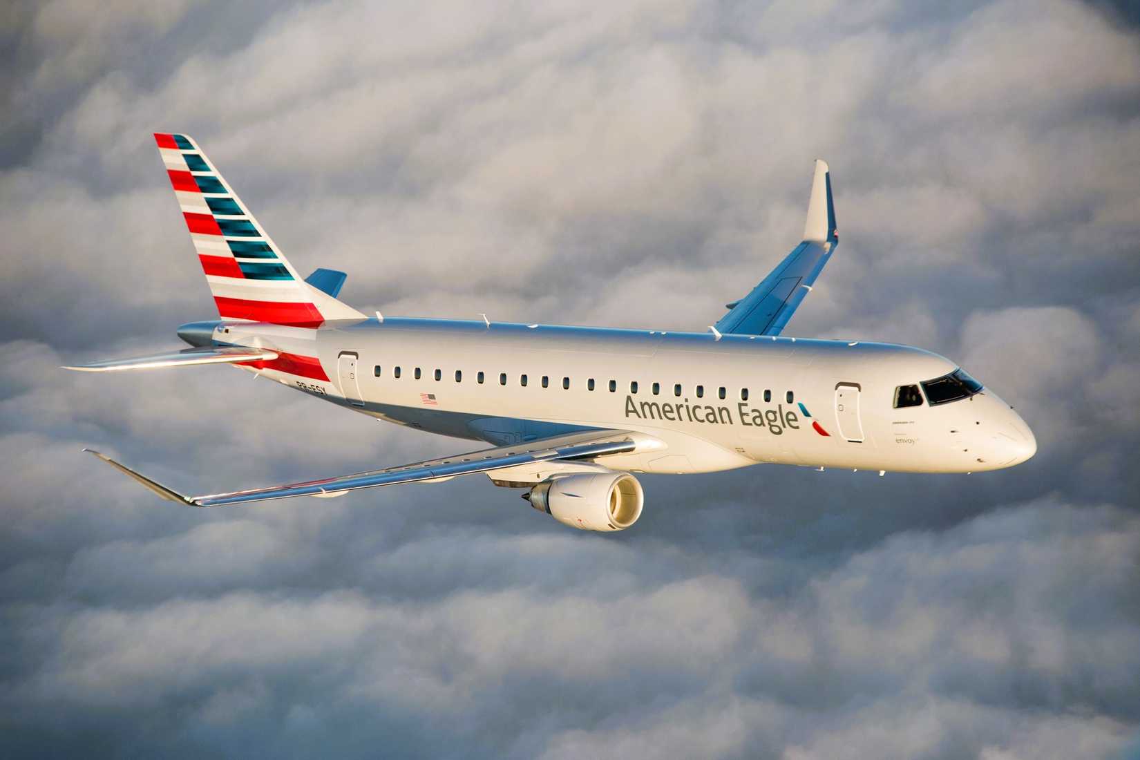 American Airlines Embraer E175 with clouds