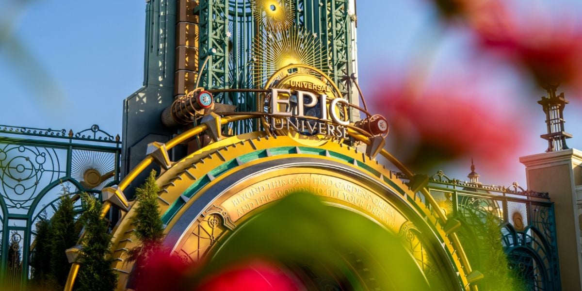 flowers in front of epic universe's entrance at universal orlando resort