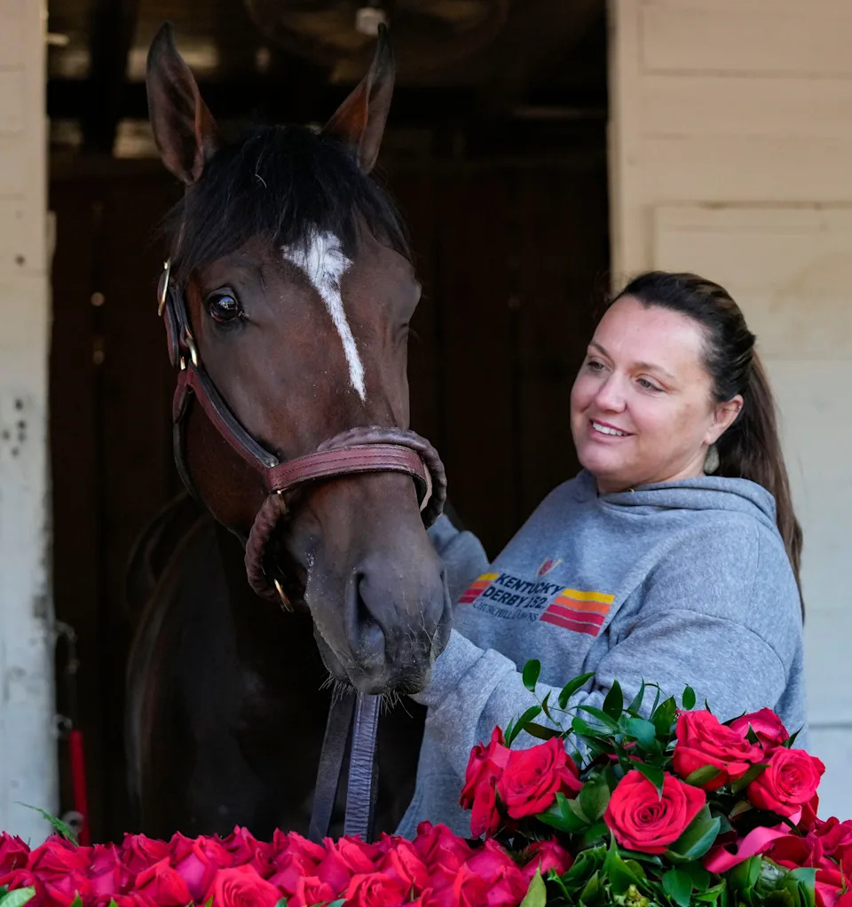 Golden Tempo stands for a photo with trainer Cherie DeVaux the day after winning the 152nd running of the Kentucky Derby at Churchill Downs on Sunday, May 3, 2026.
