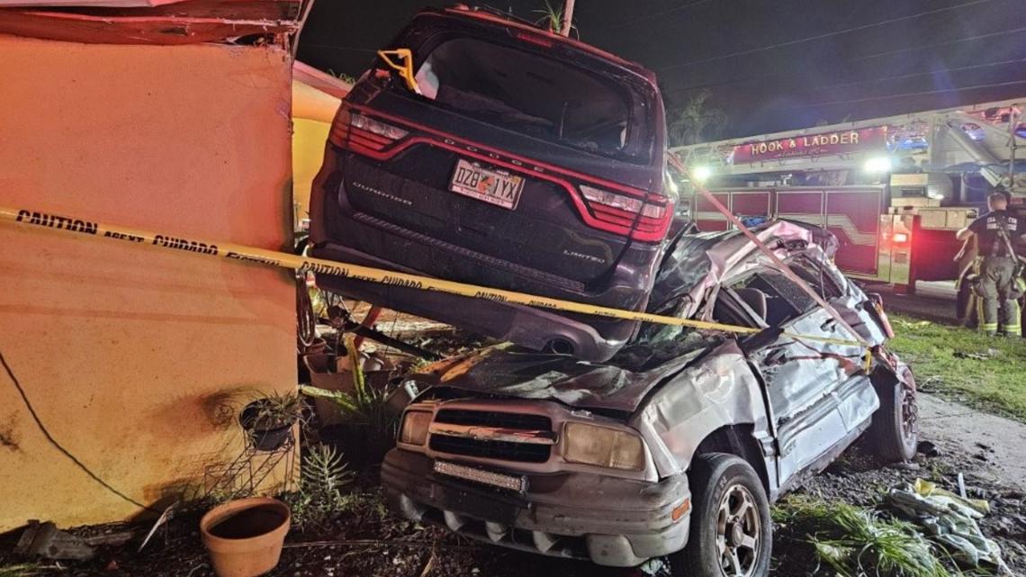 15-year-old driver loses control of car, crashes into St. Pete home and lands on top of parked car