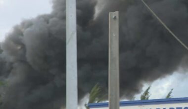 Massive five-alarm junkyard fire sends thick smoke over Opa-locka; no injuries reported