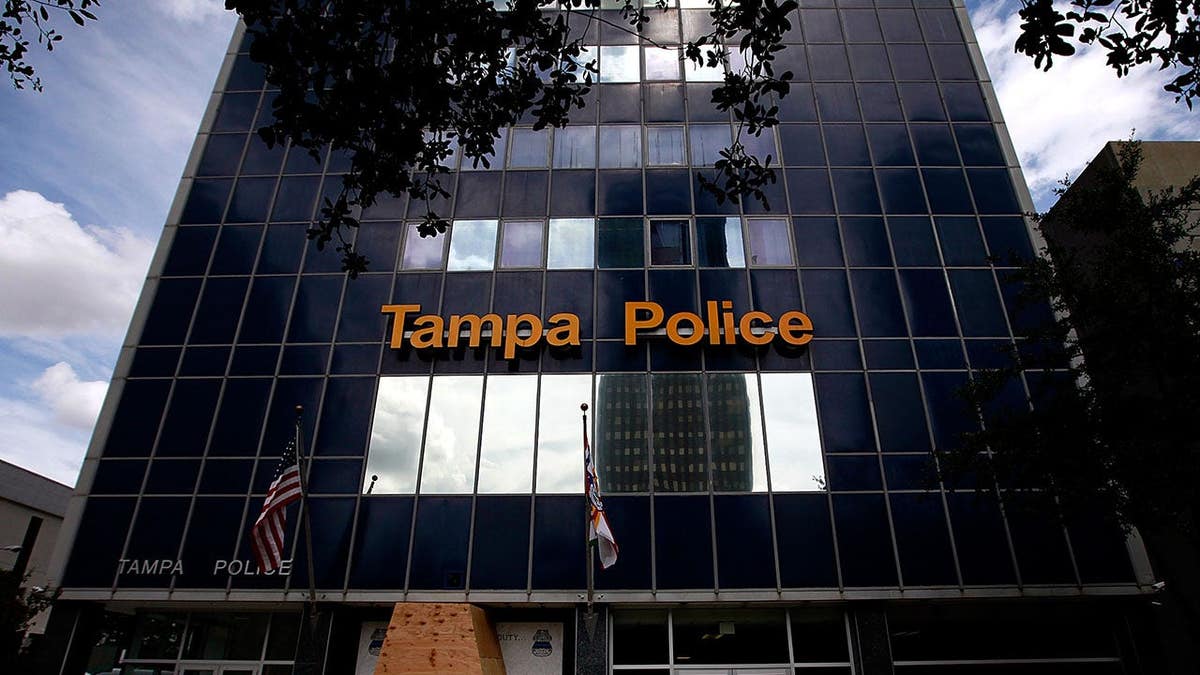 Florida National Guard members standing guard outside Tampa Police headquarters in downtown Tampa