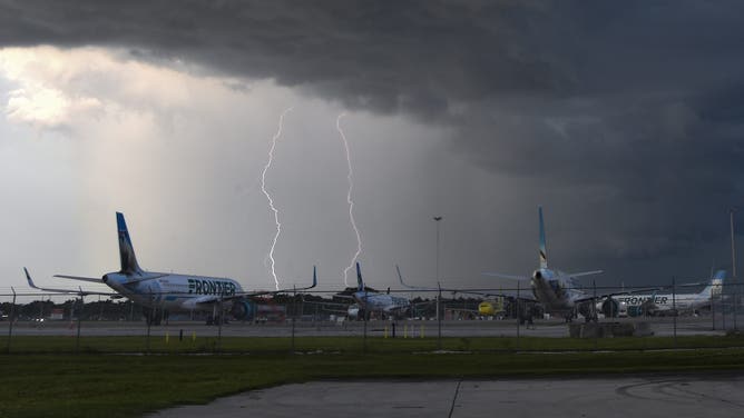 Heavy rain and lightning occur near Orlando International Airport (MCO) in Orlando, United States, on September 5, 2023.