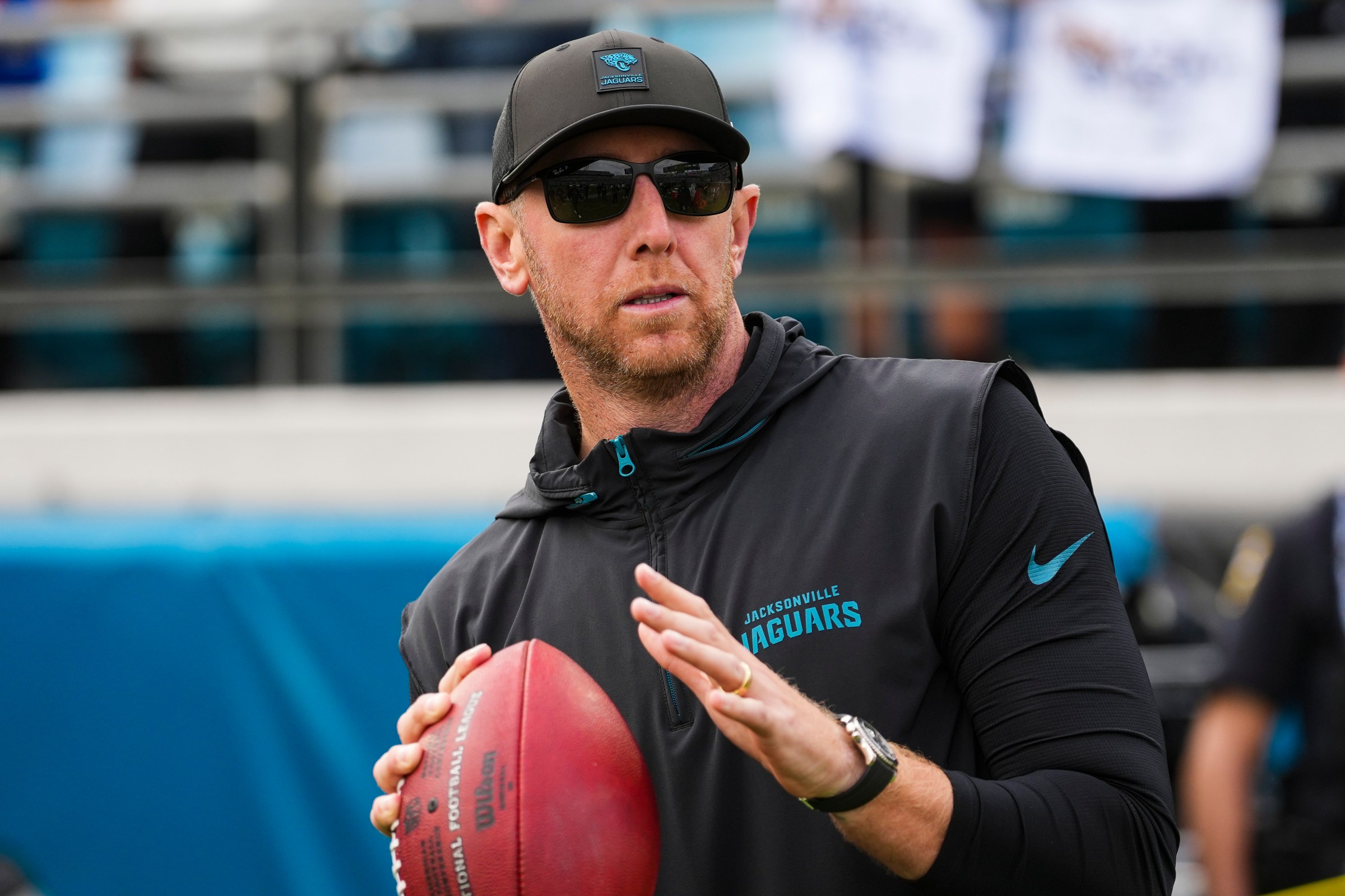 JACKSONVILLE, FLORIDA - JANUARY 11: Liam Coen of the Jacksonville Jaguars looks on from the field during warmups prior to an NFL wild card playoff football game against the Buffalo Bills at EverBank Stadium on January 11, 2026 in Jacksonville, FL. (Photo by Perry Knotts/Getty Images)