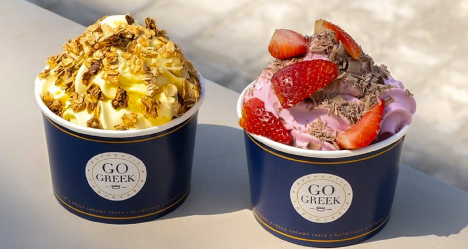 a pair of yogurt cups
