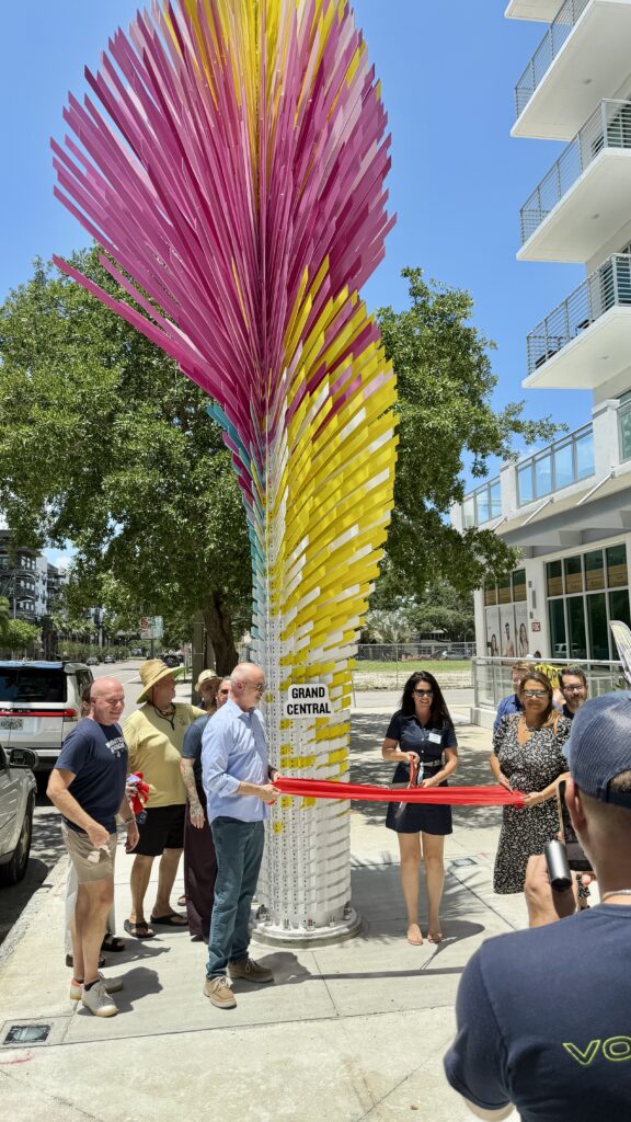People at a ribbon cutting