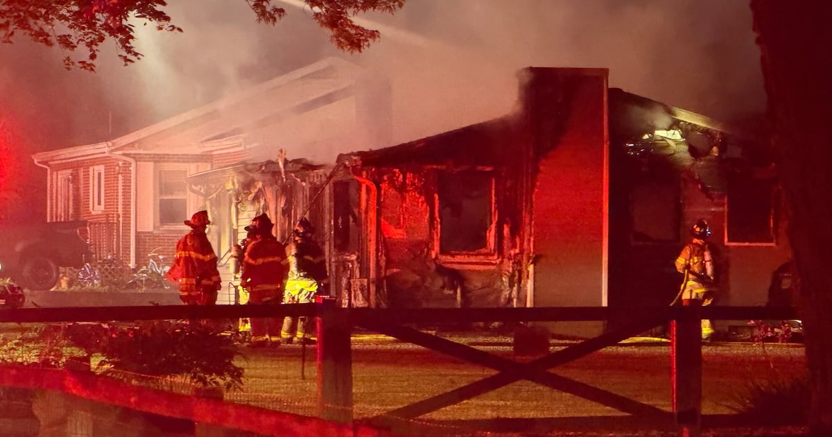 Two dogs are dead after a house fire in Miami County early Friday