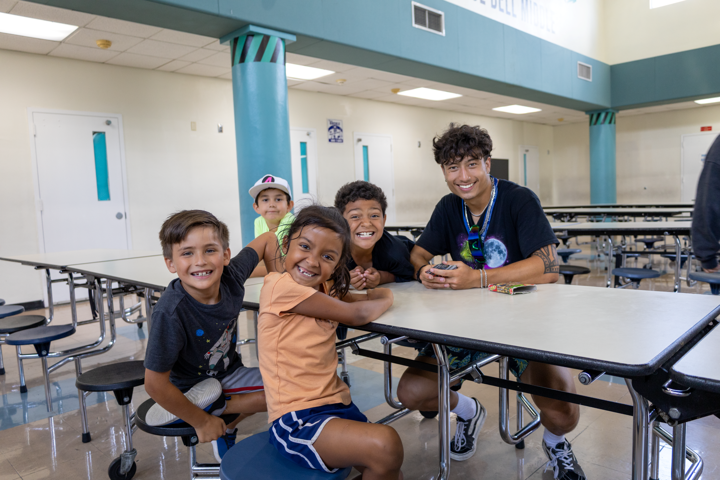 Kids at the Summer Treatment Program with their counselor