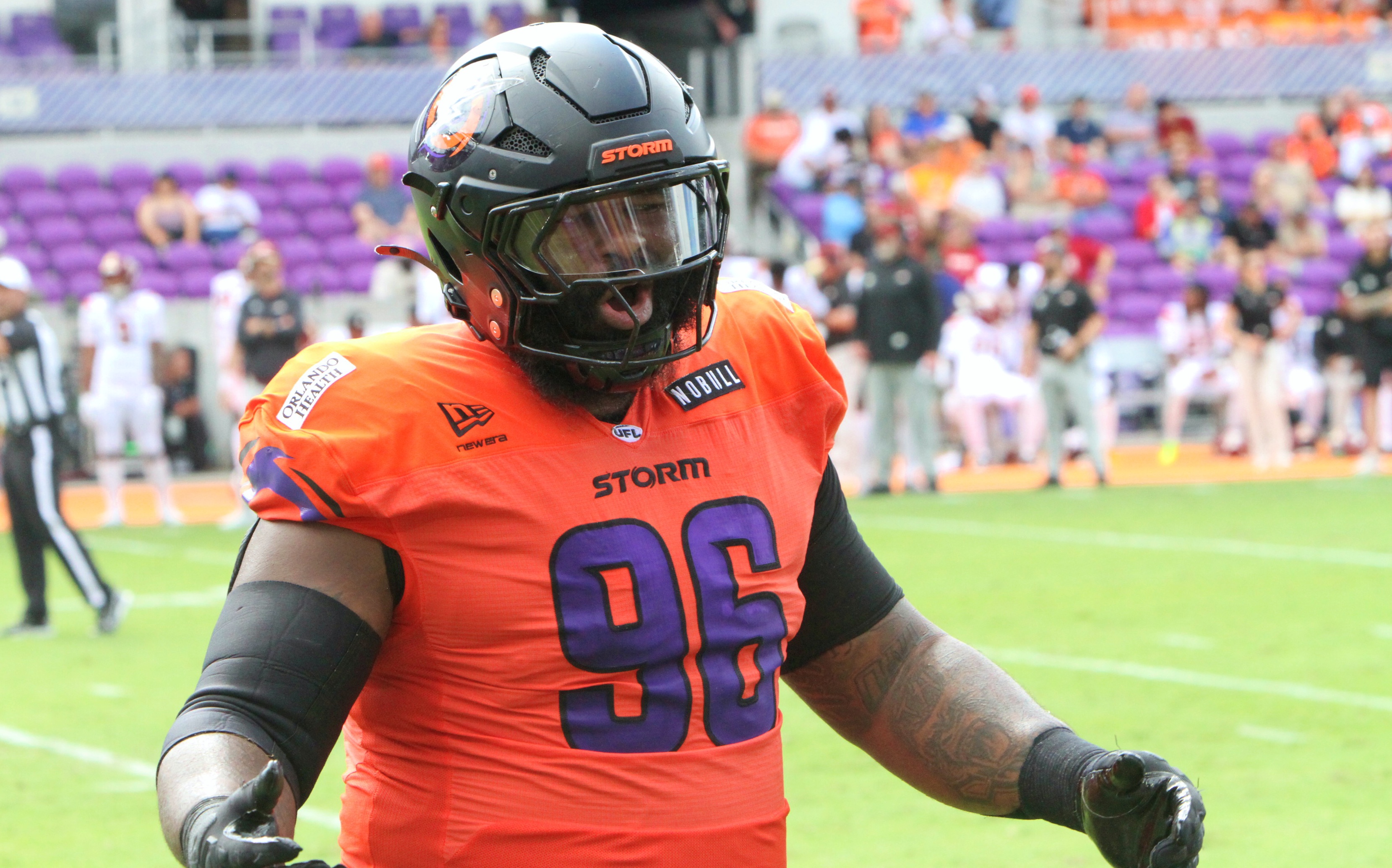 Orlando defensive lineman Isaiah Buggs comes off the field during...
