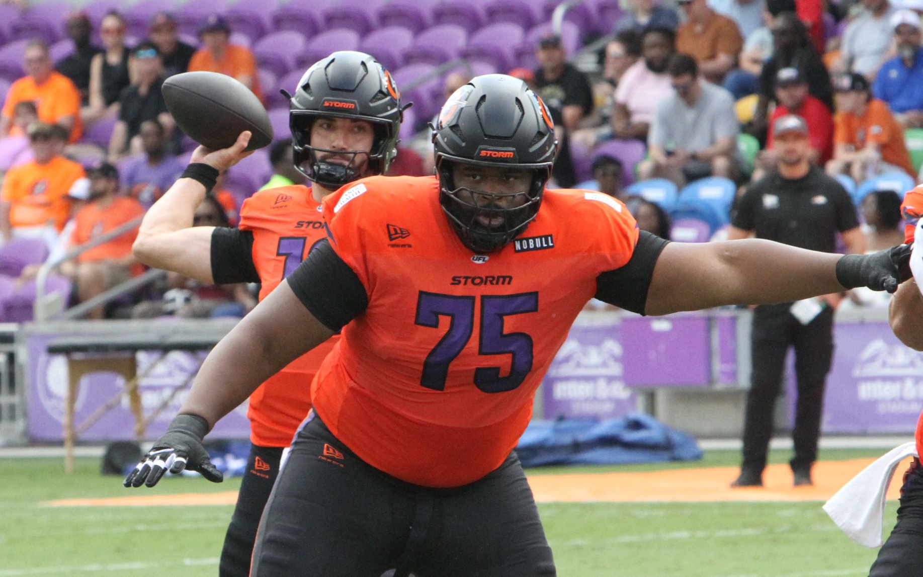 Orlando offensive lineman Mike Edwards provides protection for quarterback Jack...