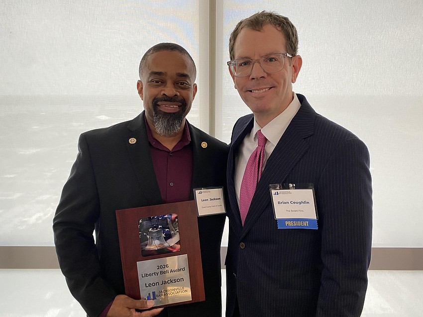 Leon Jackson, senior manager of jury services with the Duval County Clerk of Courts, accepted the 2026 Liberty Bell Award from Jacksonville Bar Association President Brian Coughlin. Leon Jackson, senior manager of jury services with the Duval County Clerk of Courts, accepted the 2026 Liberty Bell Award from Jacksonville Bar Association President Brian Coughlin.