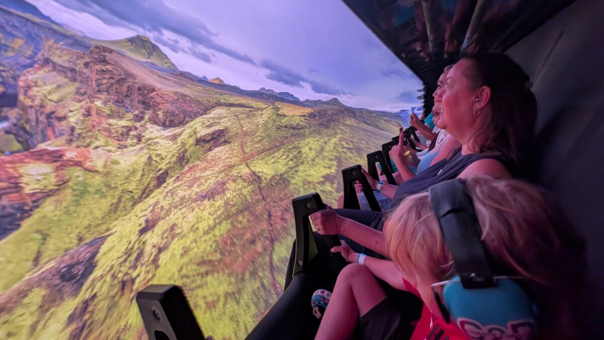 mother and son enjoy Expedition Odyssey Fire & Ice ride scene