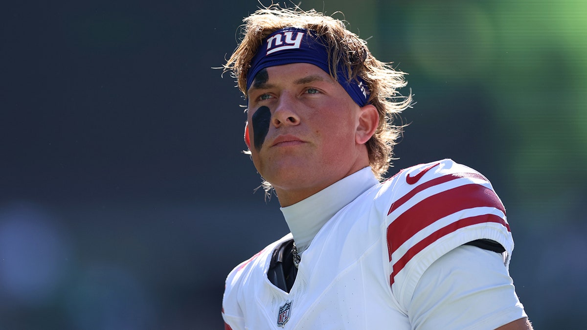New York Giants quarterback Jaxson Dart looking on at Lincoln Financial Field