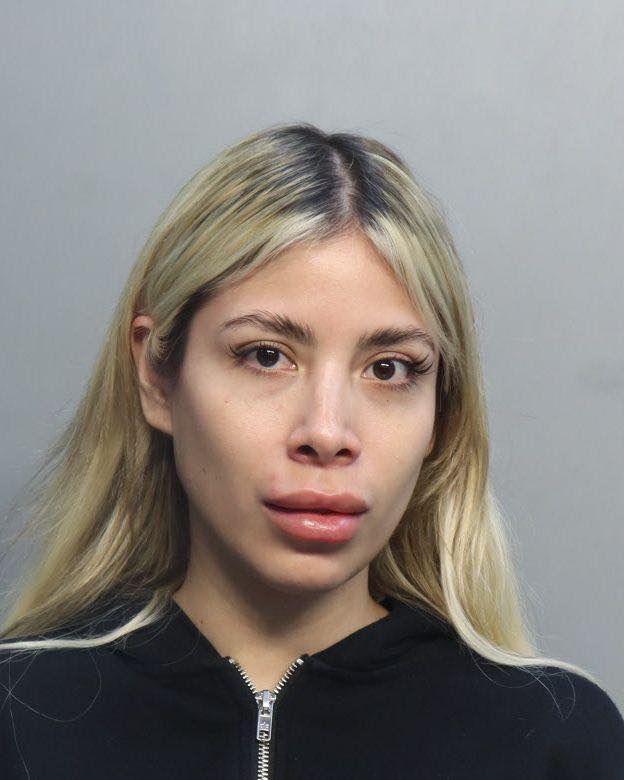 Nicole Cano is charged with false imprisonment and strong-arm robbery after allegedly inviting the victim to her luxury Biscayne Bay condo on April 11, 2026.