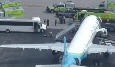 4 passengers hospitalized after being evacuated from plane at Opa-locka airport, Miami-Dade officials say