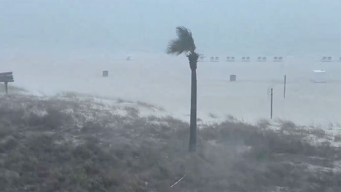 Heavy rain obscures the view of the ocean in Panama City Beach, Florida, on May 13, 2024.