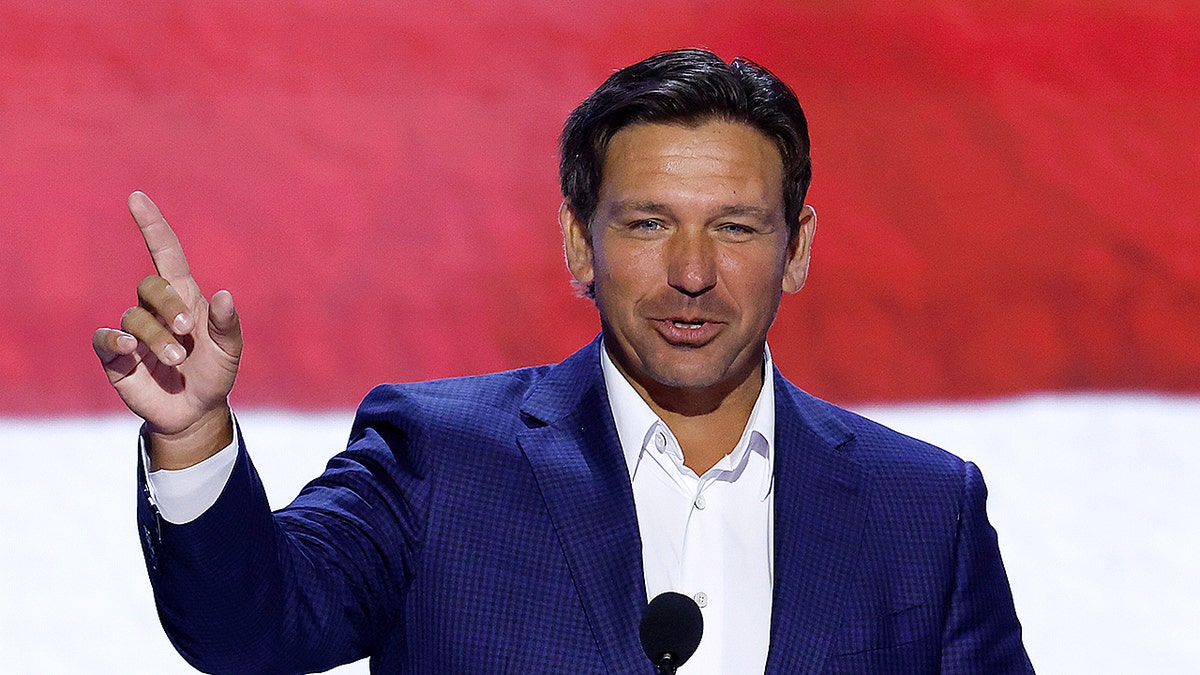 Florida Gov. Ron DeSantis speaking and pointing during an event